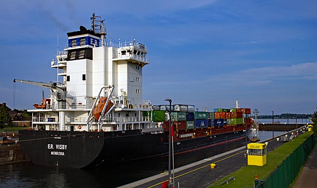 Kiel - Kiel canal - a container freighter is locked through