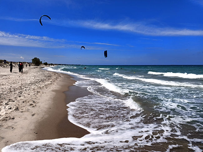 Kos in Greece - Kitesurfers on the beach – however, in the north of the island