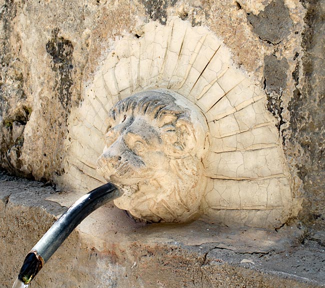 Kos in Greece - Pyli - Lion-head water spouts at the village well, Pigi