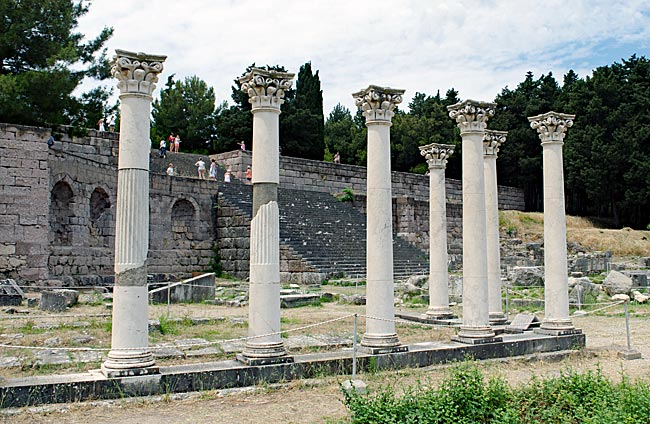 Kos in Greece - Asclepieion - The columns of the Temple of Apollo; behind them, the exedra next to the open staircase