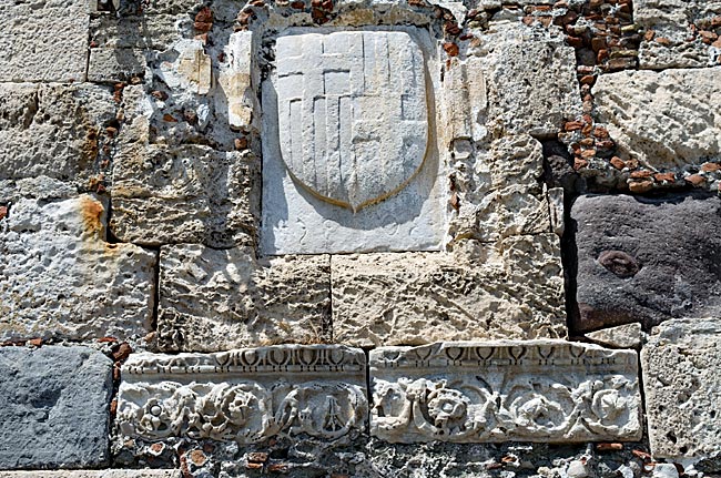 Kos Town in Greece - inlaid coat of arms still adorns the outer wall today