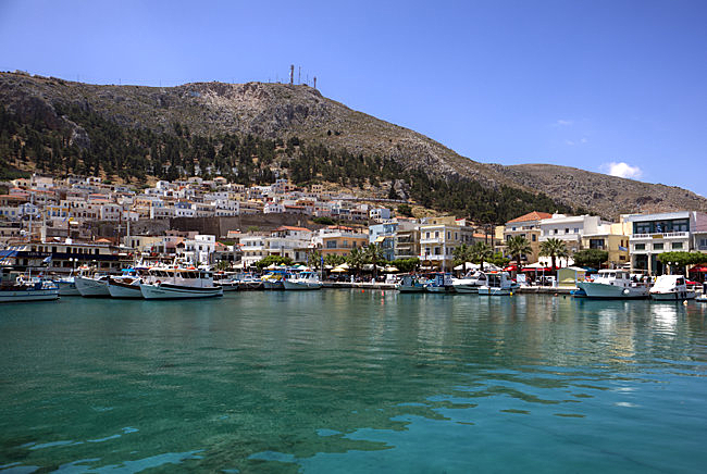 Kalymnos in Greece - Houses stretch across the mountain slopes around the port of Pothia