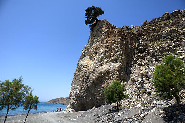 Kos in Greece - Embros-Therme - The landscape is demanding for plants; some trees cling to the barren rock