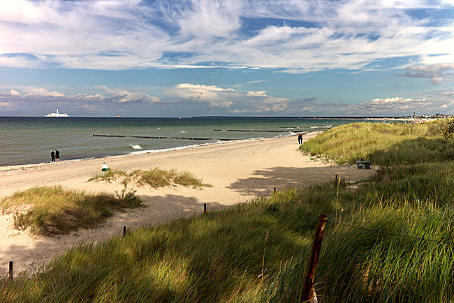 Rostock - Warnemünde - View of the beach where the hiking path meets the forest and the ascent toward the sea cliffs