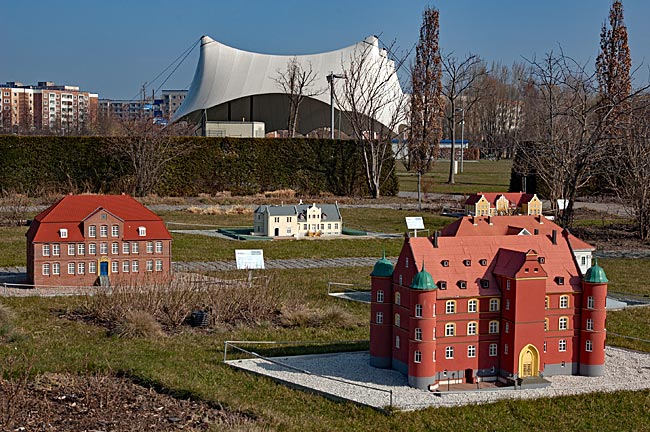 Rostock - Miniature houses in the rose garden in IGA Park, with the park stage in the background