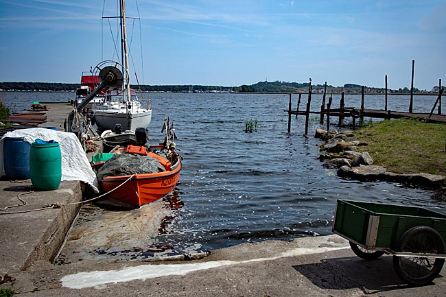 Rügen island - Boats in Klein Zicker with a view of the harbor in Thiessow in the background