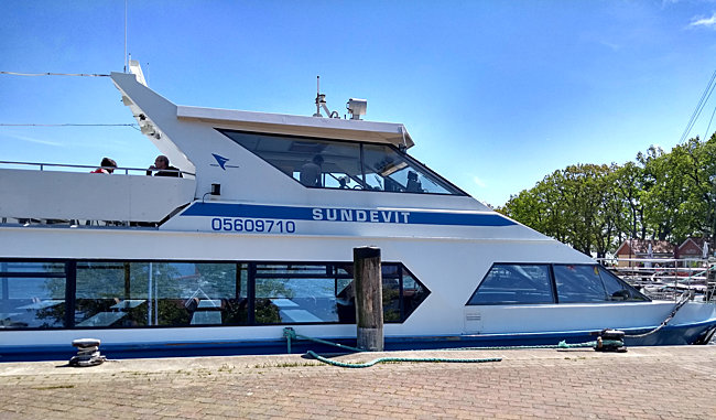 Rügen - A passenger ship of the White Fleet at the dock in Lauterbach