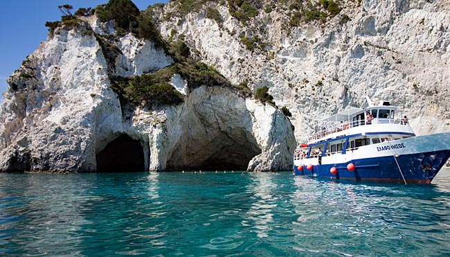 Zakynthos, the Ionian Island in Greece - One of the larger excursion ships during a swimming stop in front of the caves on the island of Marathonissi